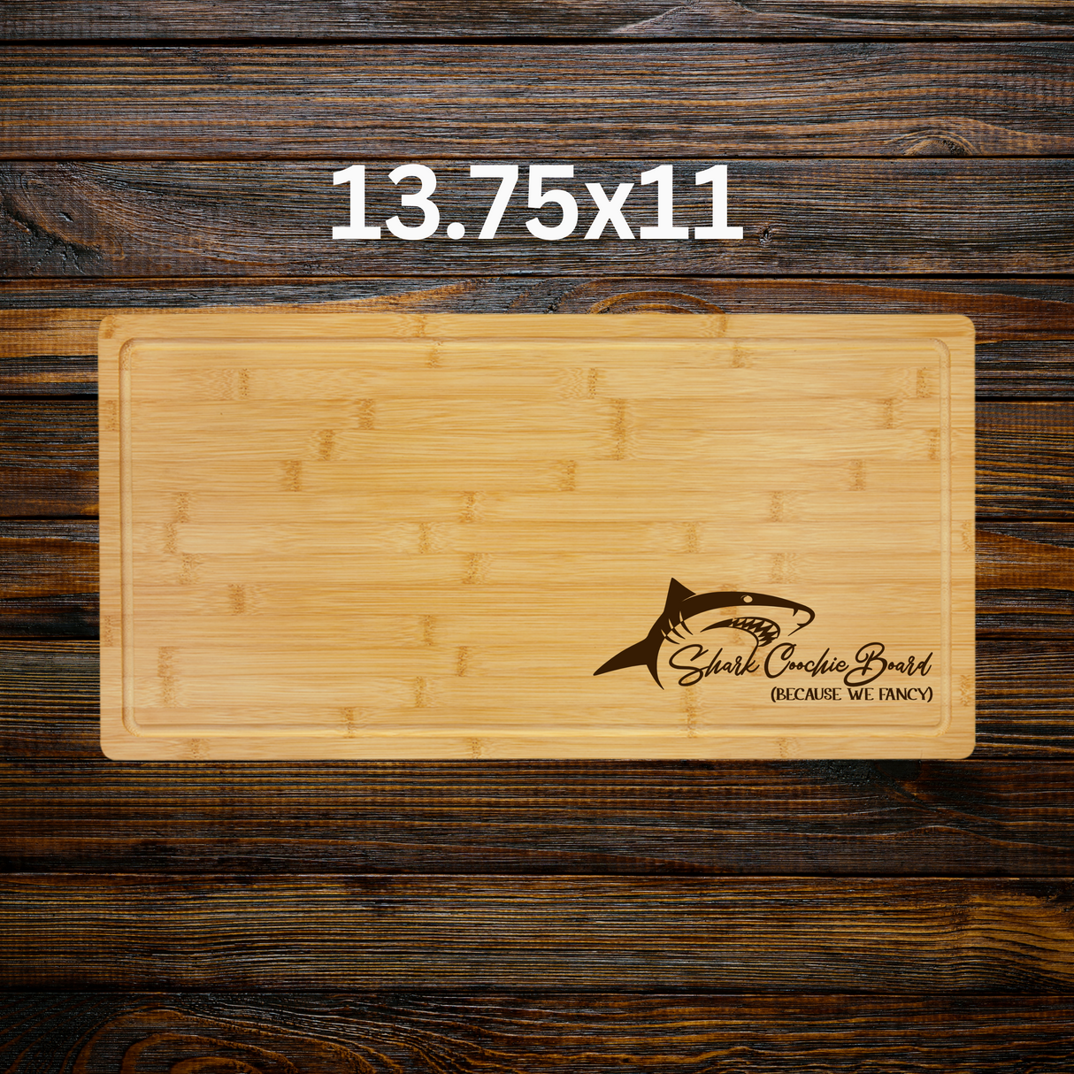 Wooden cutting board with shark logo and text on a wooden background