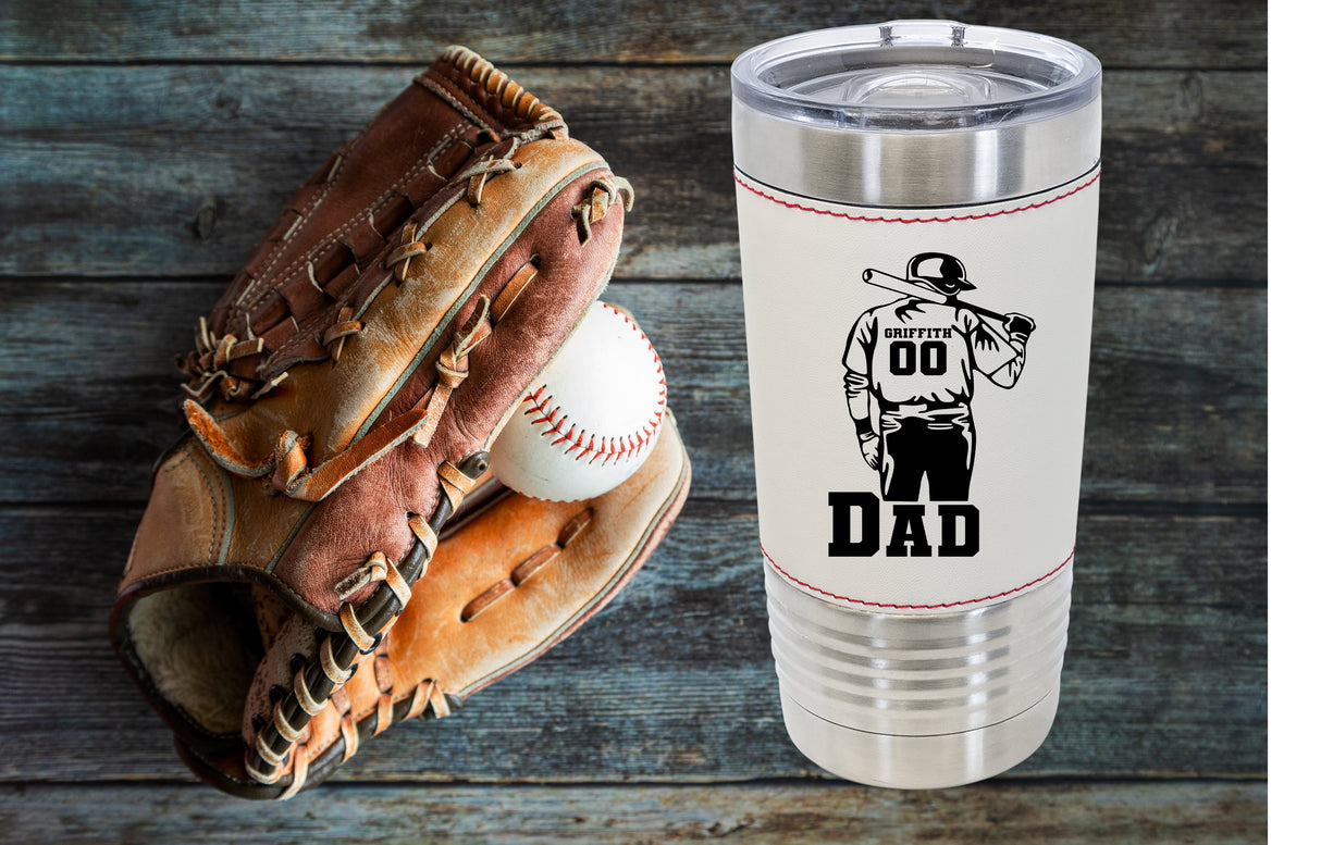 20 oz tumbler baseball leather tumbler with ball player holding a bat with custom name and number with Dad under in block letters front view-Stack Life Customs