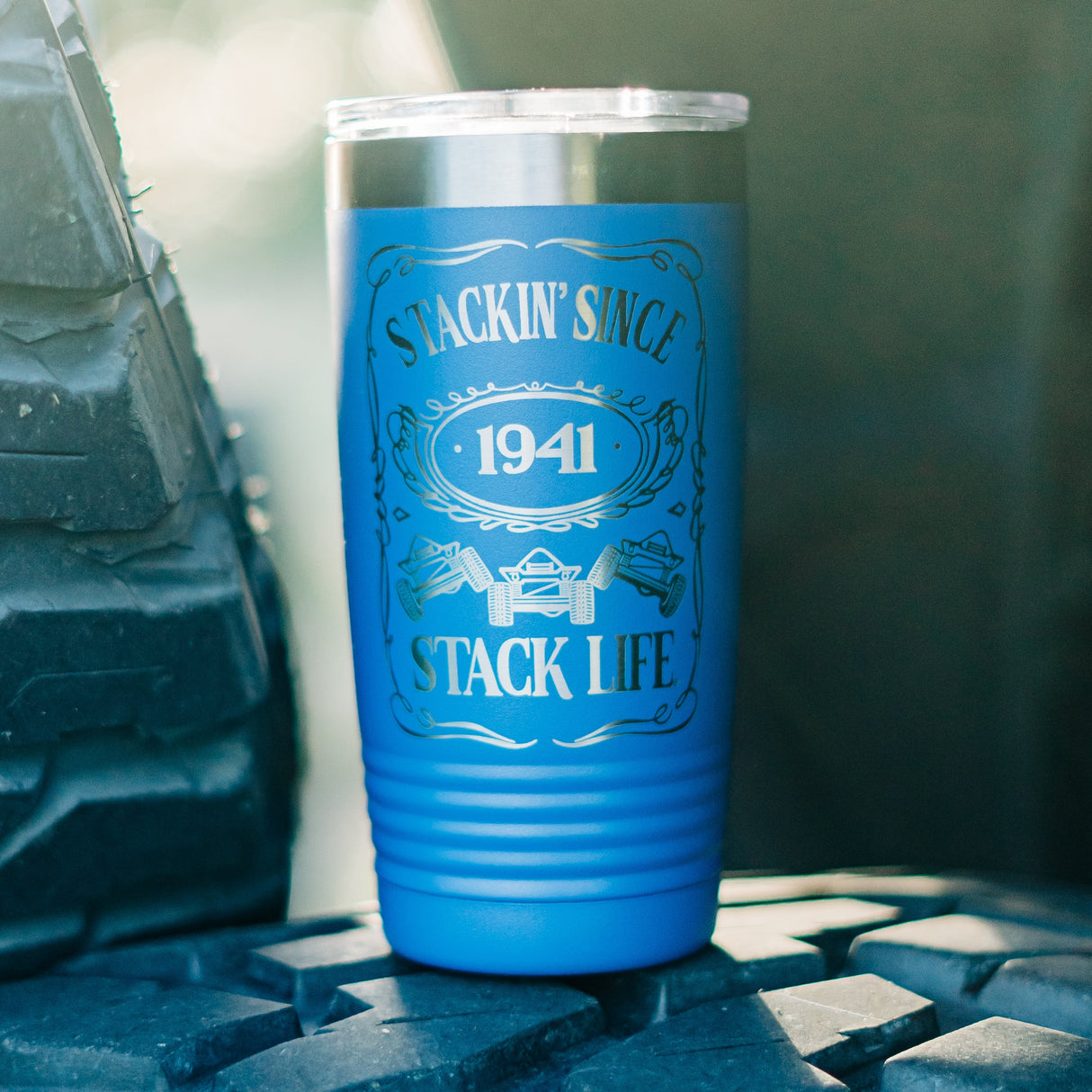 blue 20 oz stainless steel tumbler with the stackin since logo on front