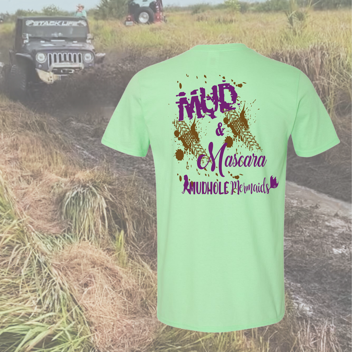Mint t-shirt with 'Mud & Mascara' text in a muddy field with off-road vehicle.