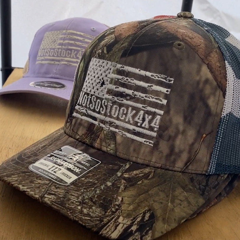 camoflauge notsostock4x4 trucker hat with white american flag
