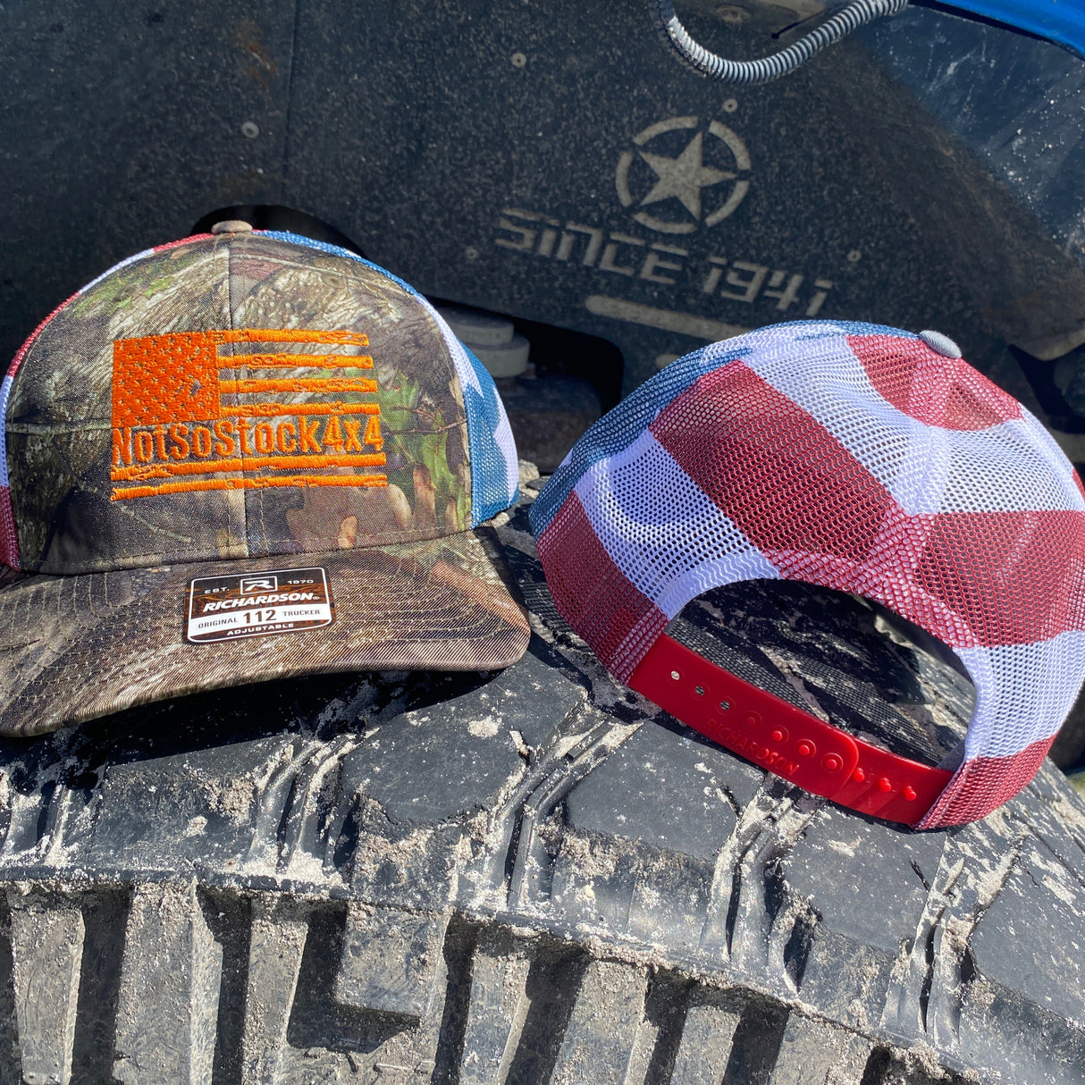 front back view of american flag camo trucker hat with oragne notsostock 4x4 on front