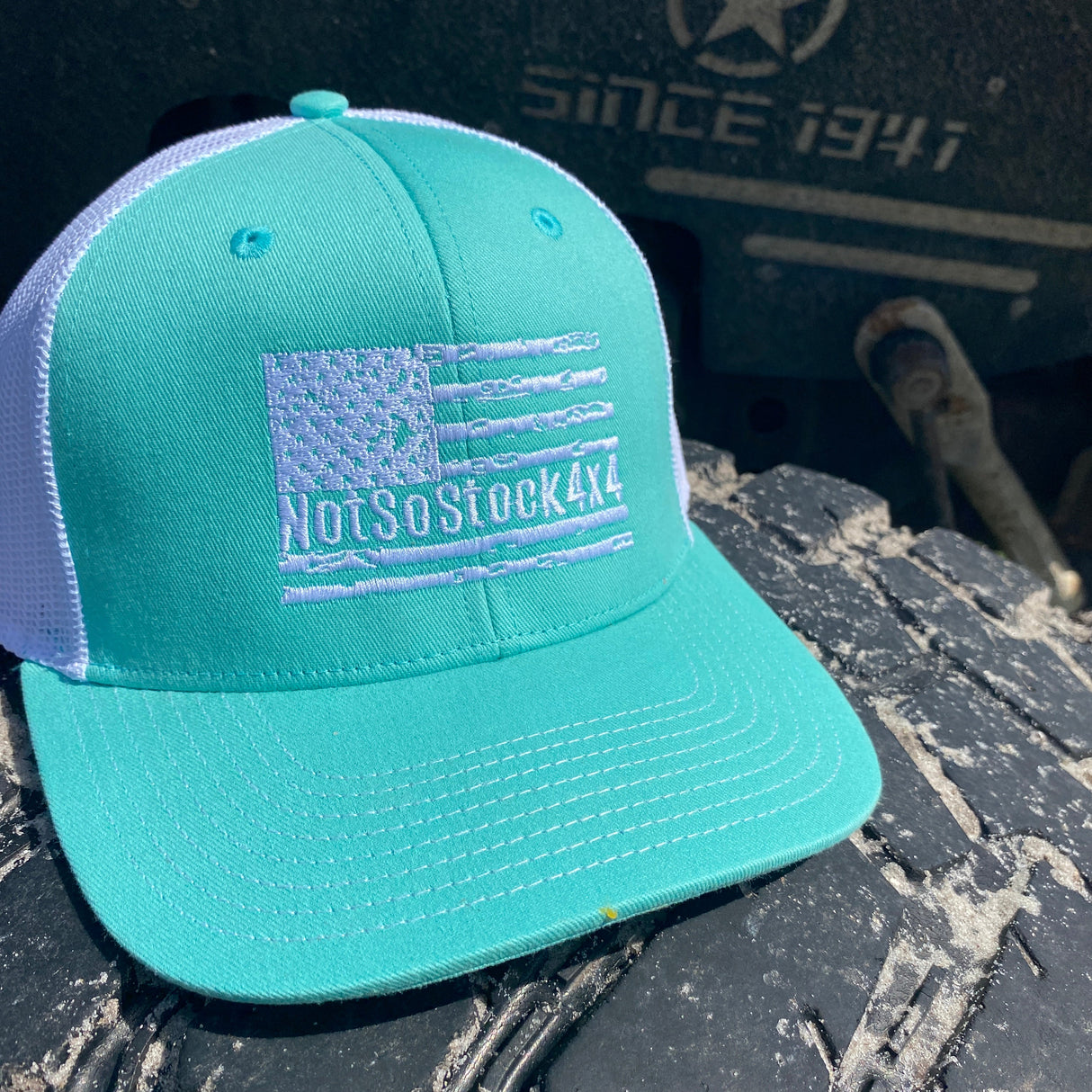 teal notsostock4x4 trucker hat with white american flag on front