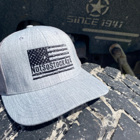 Grey trucker hat with notsostock4x4 american flag in black