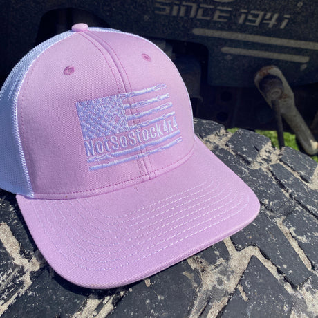 pink notsostock4x4 trucker hat with white american falg on the front
